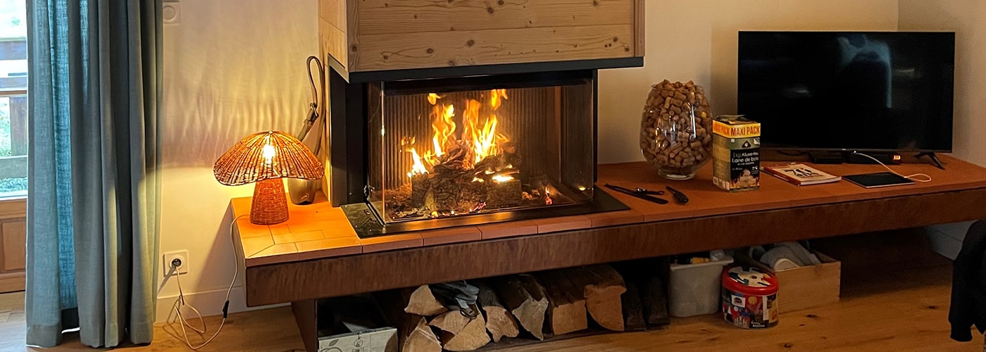 Cheminée parfaitement intégrée au foyer Cheminée parfaitement intégrée au foyer